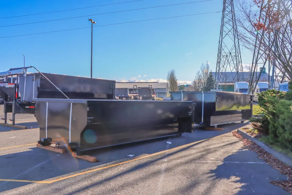 Roll-off dumpster ready for waste disposal at job site for Commercial Dumpster Rental in Bucksport